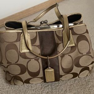 Lovely Gold trim Coach tote! Great as a travel or workbag!